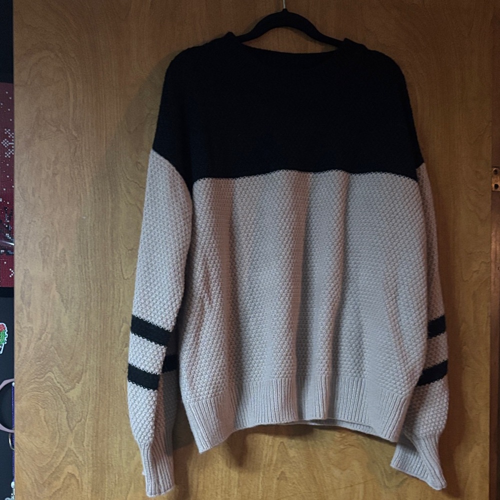 Black and tan sweater